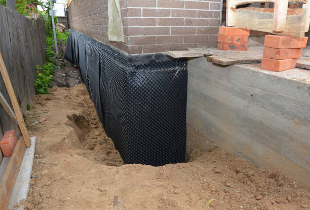 Happy homeowners after waterproofing job in Black Creek